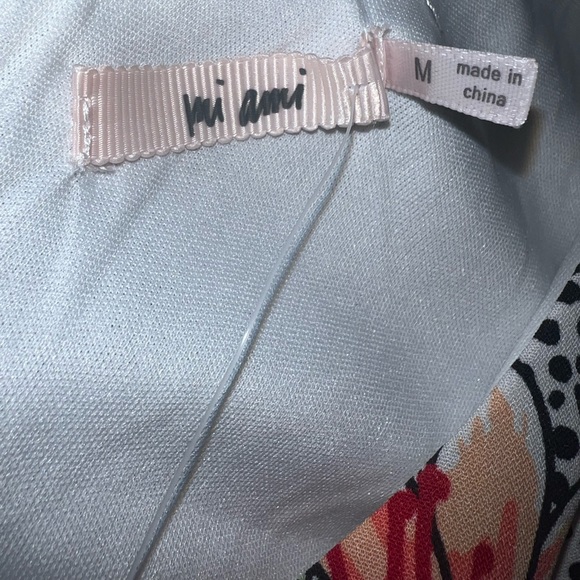 Francesca’s Mi ami asymmetrical dress. Size medium. B&W w/ tropical flowers - Picture 6 of 9